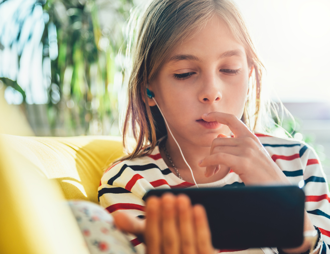 Young girl on smartphone